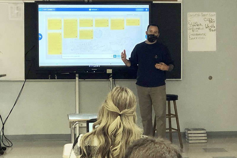 Conor Murphy, a teacher at West Genesee High School, in Camillus, N.Y., conducts his "Participation in Government" class, Thursday, Jan. 7, 2021. Many teachers say they are treading cautiously in light of varied political viewpoints in their classrooms and communities. But 