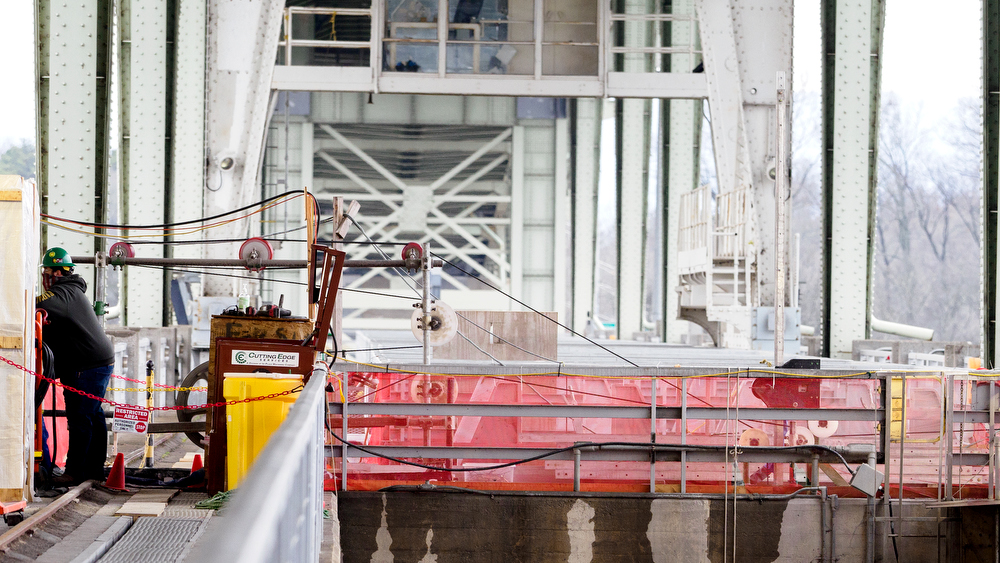 Staff photo by C.B. Schmelter / A crew monitors the diamond wire saw at the Chickamauga Dam on Friday, Jan. 8, 2021 in Chattanooga, Tenn.
