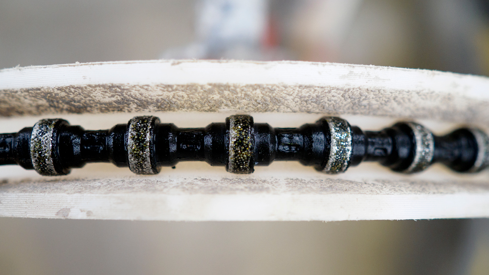 Staff photo by C.B. Schmelter / A steel cable with 15-millimeter beads rests in pulleys atop the Chickamauga Dam on Friday, Jan. 8, 2021 in Chattanooga, Tenn. The cable is part of a diamond wire saw used to cut through the dam to allow for expansion of the concrete.