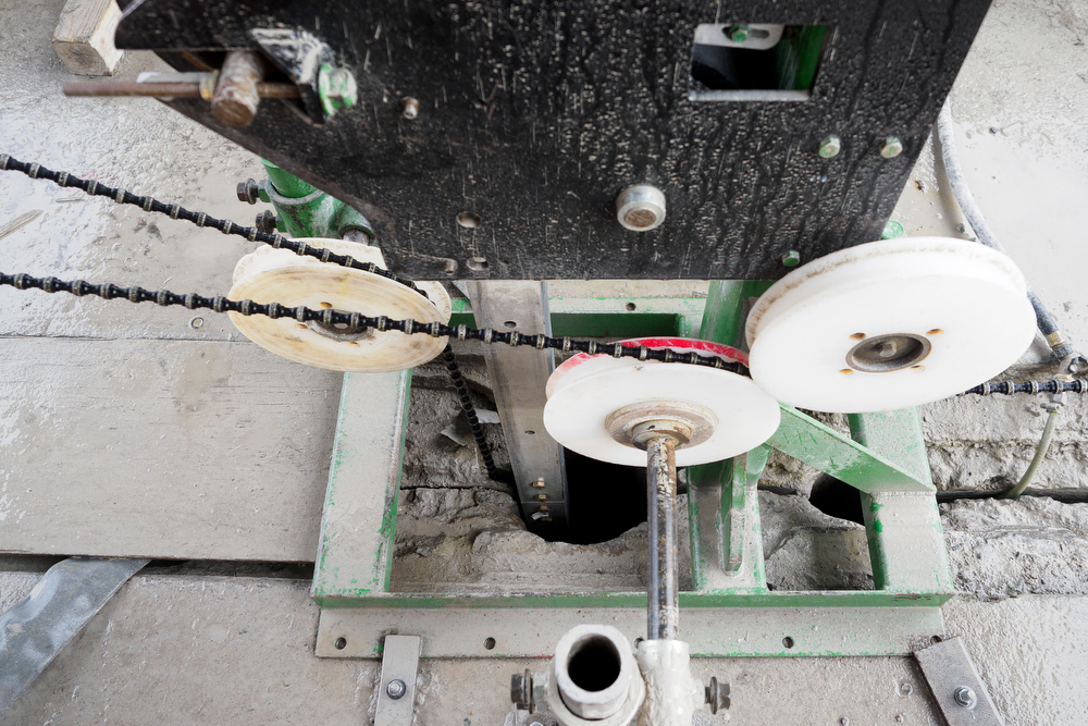 Staff photo by C.B. Schmelter / The band of a diamond wire saw runs through pulls at the Chickamauga Dam on Friday, Jan. 8, 2021 in Chattanooga, Tenn. The band is part of a diamond wire saw used to cut through the dam to allow for expansion of the concrete.