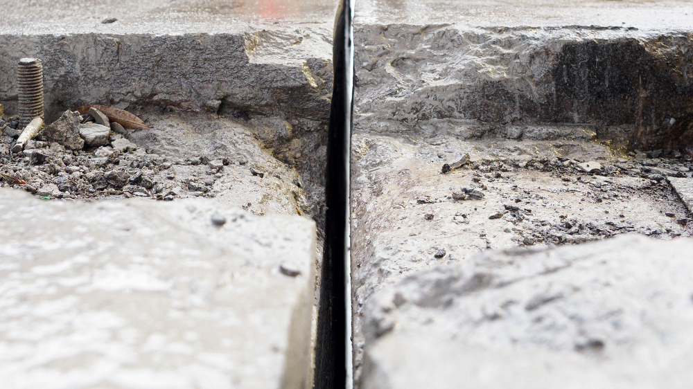 Staff photo by C.B. Schmelter / The cut made by a diamond wire saw is seen atop the Chickamauga Dam on Friday, Jan. 8, 2021 in Chattanooga, Tenn. The cut is made by a steel cable with 15-millimeter diamond beads.