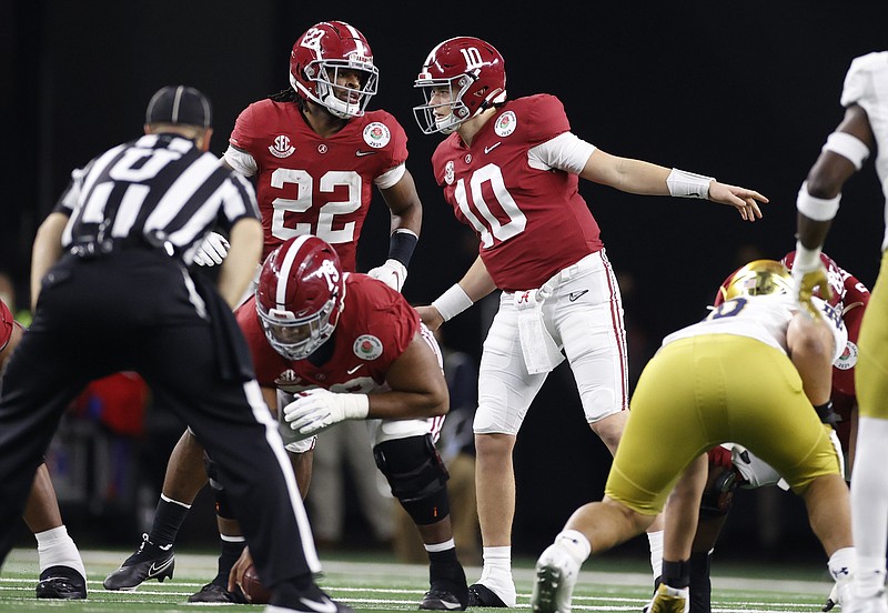 Crimson Tide Photos / Alabama senior running back Najee Harris (22) and redshirt junior quarterback Mac Jones (10) will try to lead the Crimson Tide to their first undefeated season since 2009 against Ohio State in the College Football Playoff title game Monday night in Miami Gardens, Fla.