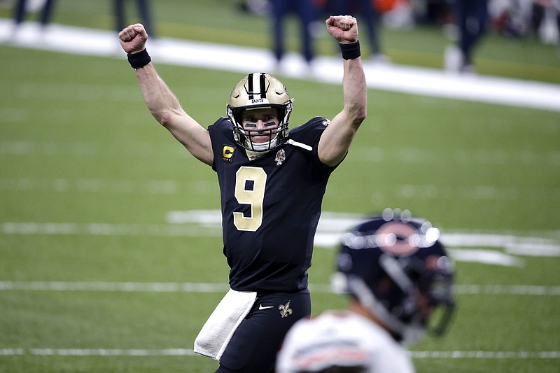 AP photo by Butch Dill / New Orleans Saints quarterback Drew Brees celebrates after a touchdown by Alvin Kamara in the second half of Sunday's home win against the Chicago Bears in an NFC wild-card playoff game.