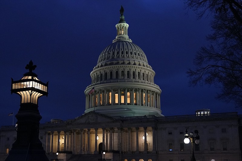 FILE - This Wednesday evening, Jan. 6, 2021 file photo shows the U.S. Capitol in Washington. (AP Photo/Jacquelyn Martin)

