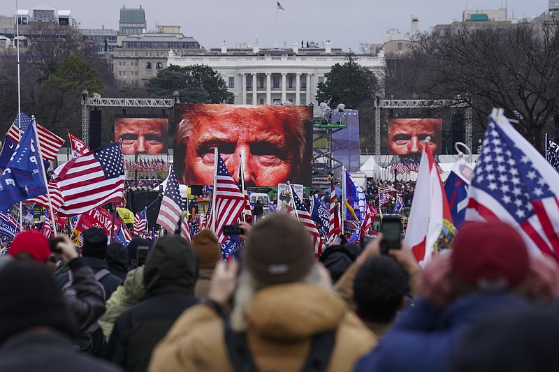 Photo by John Minchillo of The Associated Press / In this Jan. 6, 2021, file photo, supporters of President Donald Trump participate in a rally in Washington before thousands of Trump supporters marched to the Capitol.