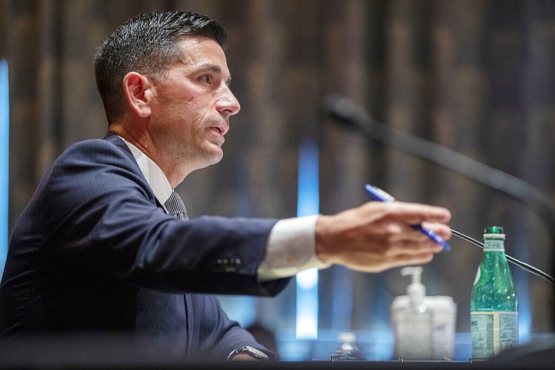 In this Sept. 23, 2020, file photo, acting Secretary of Homeland Security Chad Wolf testifies before the Senate Homeland Security and Governmental Affairs committee during his confirmation hearing on Capitol Hill in Washington. Wolf is resigning Jan. 11, 2021, days after criticizing President Donald Trump. (Shawn Thew/Pool via AP)