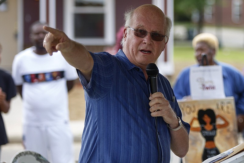 Staff photo by C.B. Schmelter/ Habitat for Humanity President and CEO David Butler speaks during a dedication ceremony for Vanester Steele and Betty Hurd's homes on Saturday, Aug. 24, 2019 in Chattanooga, Tenn. Hurd's and Steele's homes were the 15th and 16th homes built by Habitat for Humanity of Greater Chattanooga in The Villages at Alton Park neighborhood.