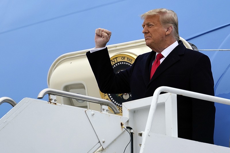The Associated Press / President Donald Trump gestures as he steps off Air Force One upon arrival at Valley International Airport last week in Harlingen, Texas.