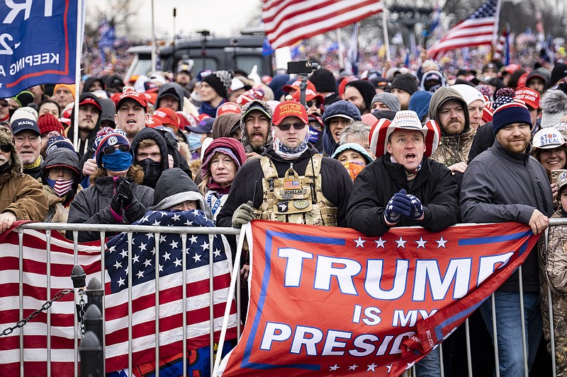 Photo by Pete Marovich of The New York Times / People gather at a rally in Washington on Wednesday, Jan. 6, 2021, to protest the presidential election results.