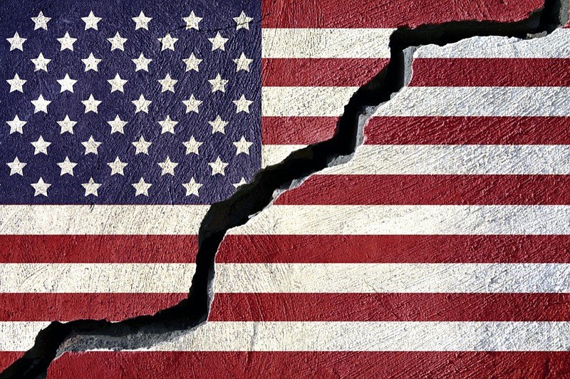 Concept american flag on cracked background america politics tile / Getty Images
