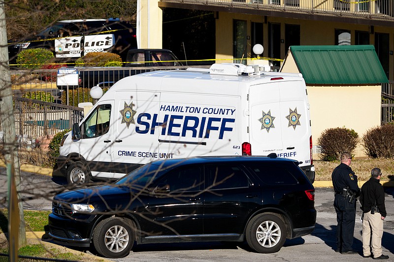 Staff photo by C.B. Schmelter / Hamilton County Sheriff's Office and Chattanooga Police Department officers investigate a shooting at America's Best Inn on Friday, Jan. 15, 2021 in Chattanooga, Tenn.