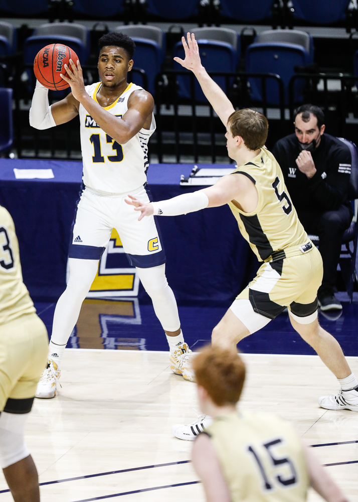 Staff photo by Troy Stolt / Chattanooga Mocs guard Malachi Smith (13) looks to pass during the UTC men's basketball game against Wofford at McKenzie Arena on Saturday, Jan. 16, 2021 in Chattanooga, Tenn.