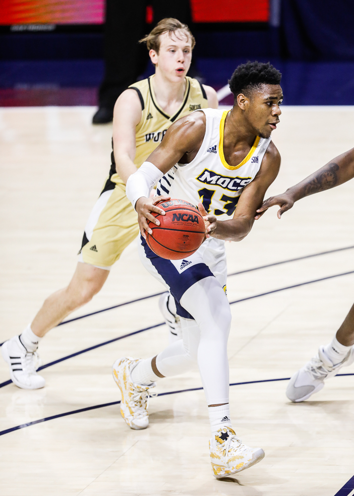 Staff photo by Troy Stolt / Chattanooga Mocs guard Malachi Smith (13) dribbles into the paint during the UTC men's basketball game against Wofford at McKenzie Arena on Saturday, Jan. 16, 2021 in Chattanooga, Tenn.