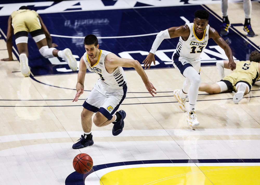 Staff photo by Troy Stolt / Chattanooga Mocs forward Stefan Kenic (33) grabs a loose ball on a fast break during the UTC men's basketball game against Wofford at McKenzie Arena on Saturday, Jan. 16, 2021 in Chattanooga, Tenn.