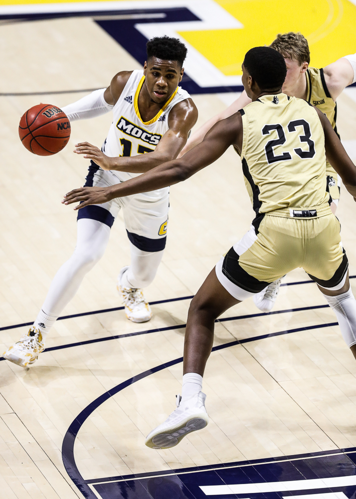 Staff photo by Troy Stolt / Chattanooga Mocs guard Malachi Smith (13) dribbles into the paint during the UTC men's basketball game against Wofford at McKenzie Arena on Saturday, Jan. 16, 2021 in Chattanooga, Tenn.