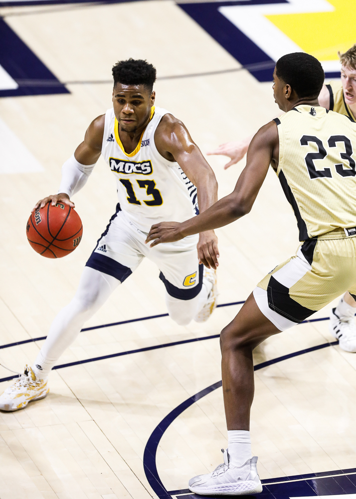 Staff photo by Troy Stolt / Chattanooga Mocs guard Malachi Smith (13) dribbles into the paint during the UTC men's basketball game against Wofford at McKenzie Arena on Saturday, Jan. 16, 2021 in Chattanooga, Tenn.