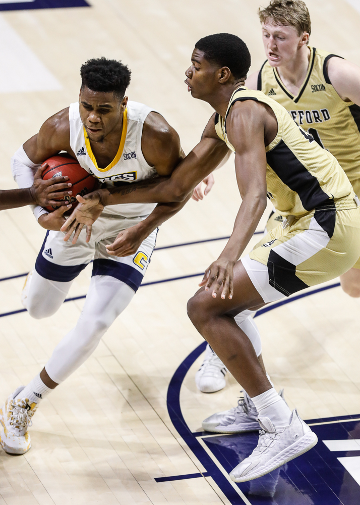 Staff photo by Troy Stolt / Chattanooga Mocs guard Malachi Smith (13) dribbles into the paint during the UTC men's basketball game against Wofford at McKenzie Arena on Saturday, Jan. 16, 2021 in Chattanooga, Tenn.