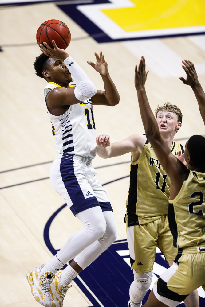 Staff photo by Troy Stolt / Chattanooga Mocs guard Malachi Smith (13) shoots the ball during the UTC men's basketball game against Wofford at McKenzie Arena on Saturday, Jan. 16, 2021 in Chattanooga, Tenn.