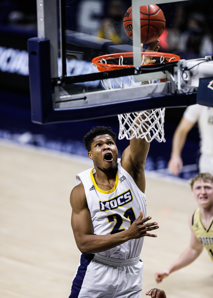 Staff photo by Troy Stolt / Chattanooga Mocs forward Josh Ayeni (21) shoots a layup during the UTC men's basketball game against Wofford at McKenzie Arena on Saturday, Jan. 16, 2021 in Chattanooga, Tenn.