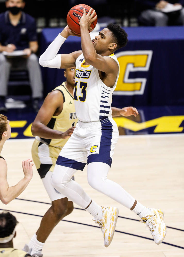 Staff photo by Troy Stolt / Chattanooga Mocs guard Malachi Smith (13) shoots the ball during the UTC men's basketball game against Wofford at McKenzie Arena on Saturday, Jan. 16, 2021 in Chattanooga, Tenn.