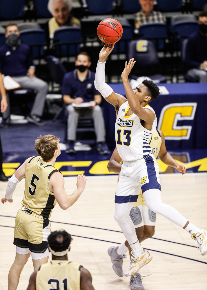 Staff photo by Troy Stolt / Chattanooga Mocs guard Malachi Smith (13) shoots the ball during the UTC men's basketball game against Wofford at McKenzie Arena on Saturday, Jan. 16, 2021 in Chattanooga, Tenn.