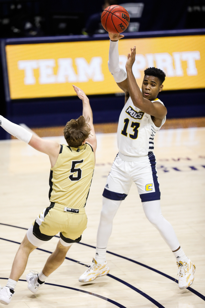 Staff photo by Troy Stolt / Chattanooga Mocs guard Malachi Smith (13) passes the ball during the UTC men's basketball game against Wofford at McKenzie Arena on Saturday, Jan. 16, 2021 in Chattanooga, Tenn.