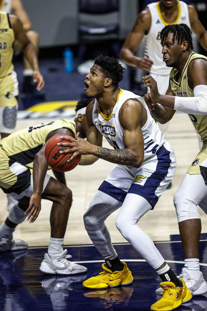 Staff photo by Troy Stolt / Chattanooga Mocs forward Josh Ayeni (21) looks to shoot during the UTC men's basketball game against Wofford at McKenzie Arena on Saturday, Jan. 16, 2021 in Chattanooga, Tenn.