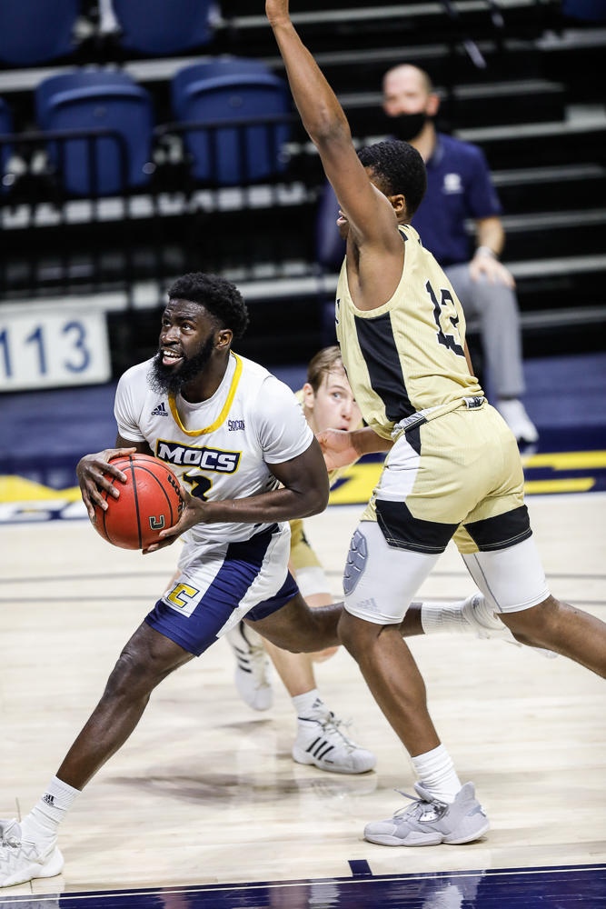 Staff photo by Troy Stolt / Chattanooga Mocs guard David Jean-Baptiste (3) drives to the basket during the UTC men's basketball game against Wofford at McKenzie Arena on Saturday, Jan. 16, 2021 in Chattanooga, Tenn.