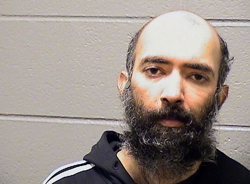 This Saturday, Jan. 16, 2021, booking photo provided by the Cook County Sheriff's Office shows Aditya Singh. Singh, of California, who told police that the coronavirus pandemic left him afraid to fly was arrested on charges that he hid in a secured area at Chicago's O'Hare International Airport for three months. (Cook County Sheriff's Office via AP)