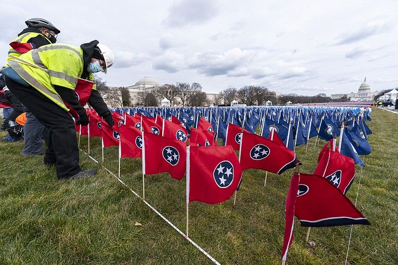 The Associated Press / State flags including the Tennessee state flag, in front, are placed on the National Mall ahead of the inauguration of President Joe Biden earlier this week in Washington, D.C.