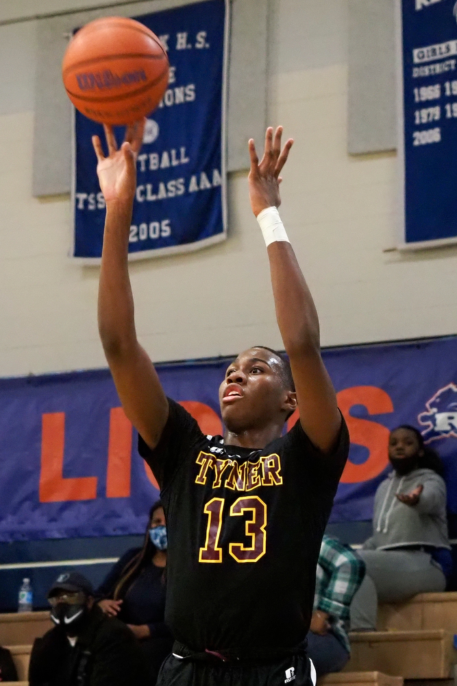 Staff photo by C.B. Schmelter / Tyner's Keelan Jackson (13) takes a shot against Red Bank at Susan Ingram Thurman Gymnasium on the campus of Red Bank High School on Thursday, Jan. 21, 2021 in Chattanooga, Tenn.