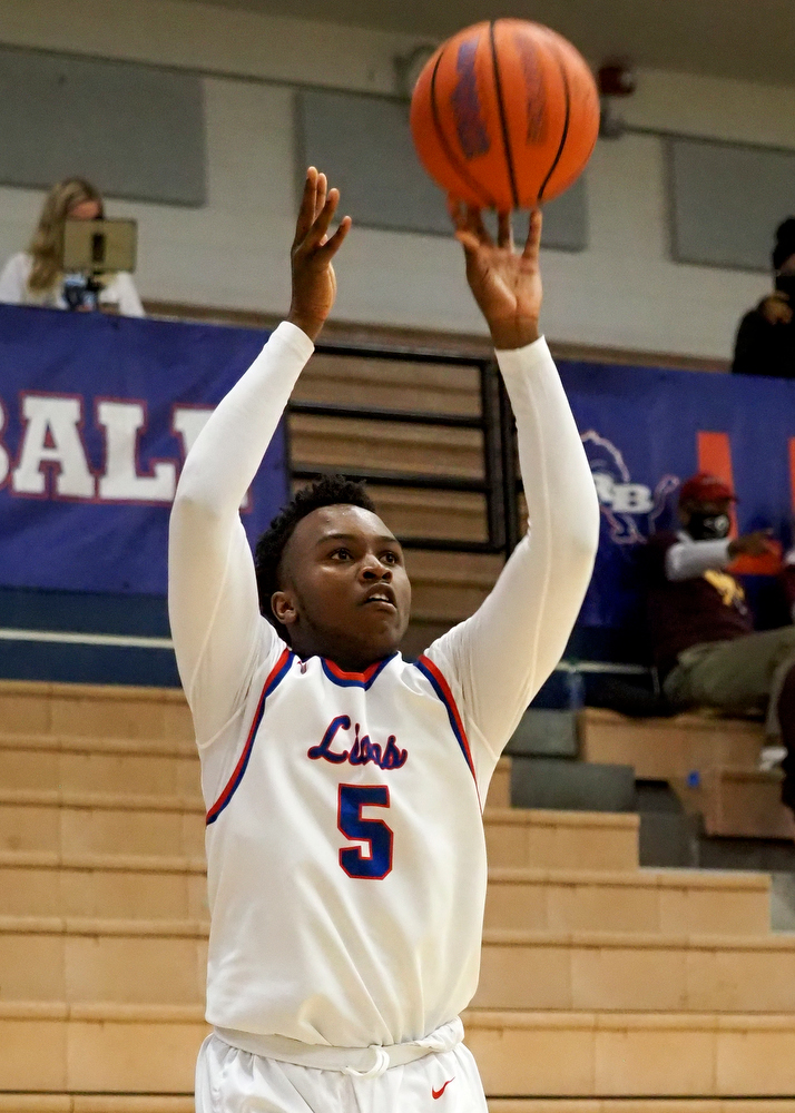 Staff photo by C.B. Schmelter / Red Bank's Nick Smith (5) drains a 3-pointer against Tyner at Susan Ingram Thurman Gymnasium on the campus of Red Bank High School on Thursday, Jan. 21, 2021 in Chattanooga, Tenn.