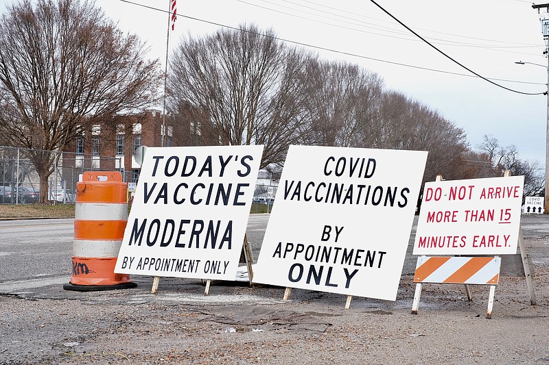 Staff photo by Wyatt Massey / Signs directing people to the vaccination site at CARTA's Bus Barn on Wilcox Boulevard are pictured on Jan. 22, 2021.