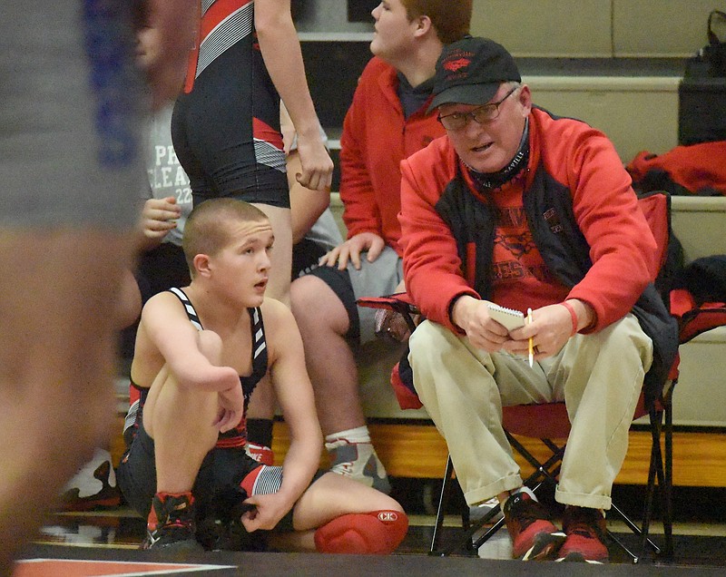 Staff photo by Matt Hamilton / Sonoraville wrestling coach Randy Steward talks to Thomas Young during the GHSA Area 6-AAA duals on Jan. 15 at LaFayette. Sonoraville won the event and will host a state duals preliminary tournament this weekend.