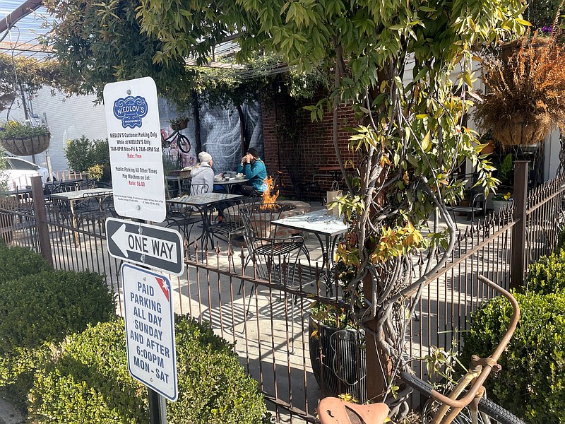 Photo by Anne Braly / Some restaurants, such as Niedlov's Cafe & Bakery on Main Street, are using outdoor seating to help distance diners during the coronavirus pandemic. Firepits and patio heaters help keep guests comfortable in cooler weather.