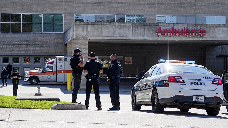 Staff photo by C.B. Schmelter / Chattanooga Police officers are seen at the scene of a shooting at CHI Memorial Hospital on Saturday, Oct. 31, 2020 in Chattanooga, Tenn.