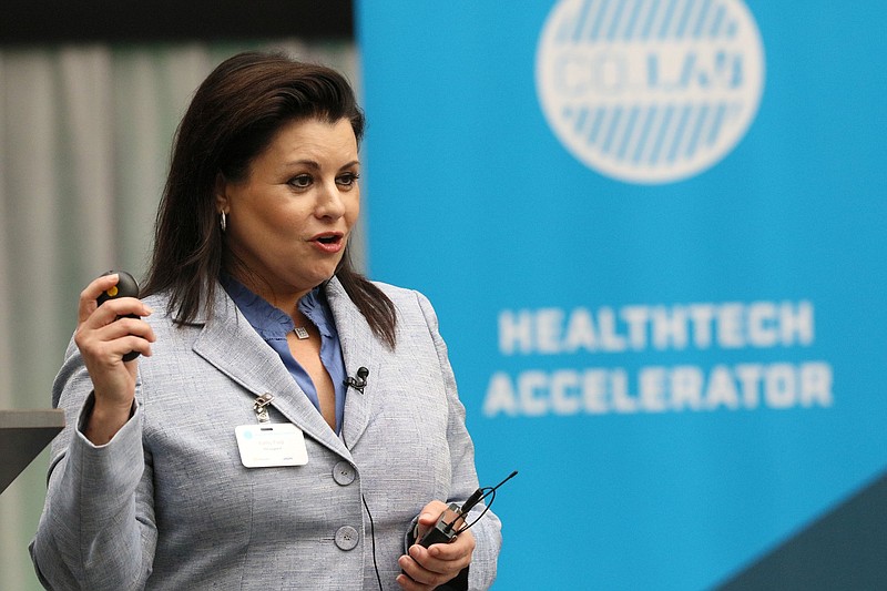 Staff photo by Erin O. Smith / Kathy Ford, president and chief product officer of Rhinogram, gives her pitch during the HealthTech Accelerator Demo Day at Unum in June 2019. Rhinogram connects patients, clinicians and office administrators through confidential, text-based interactions in real time.