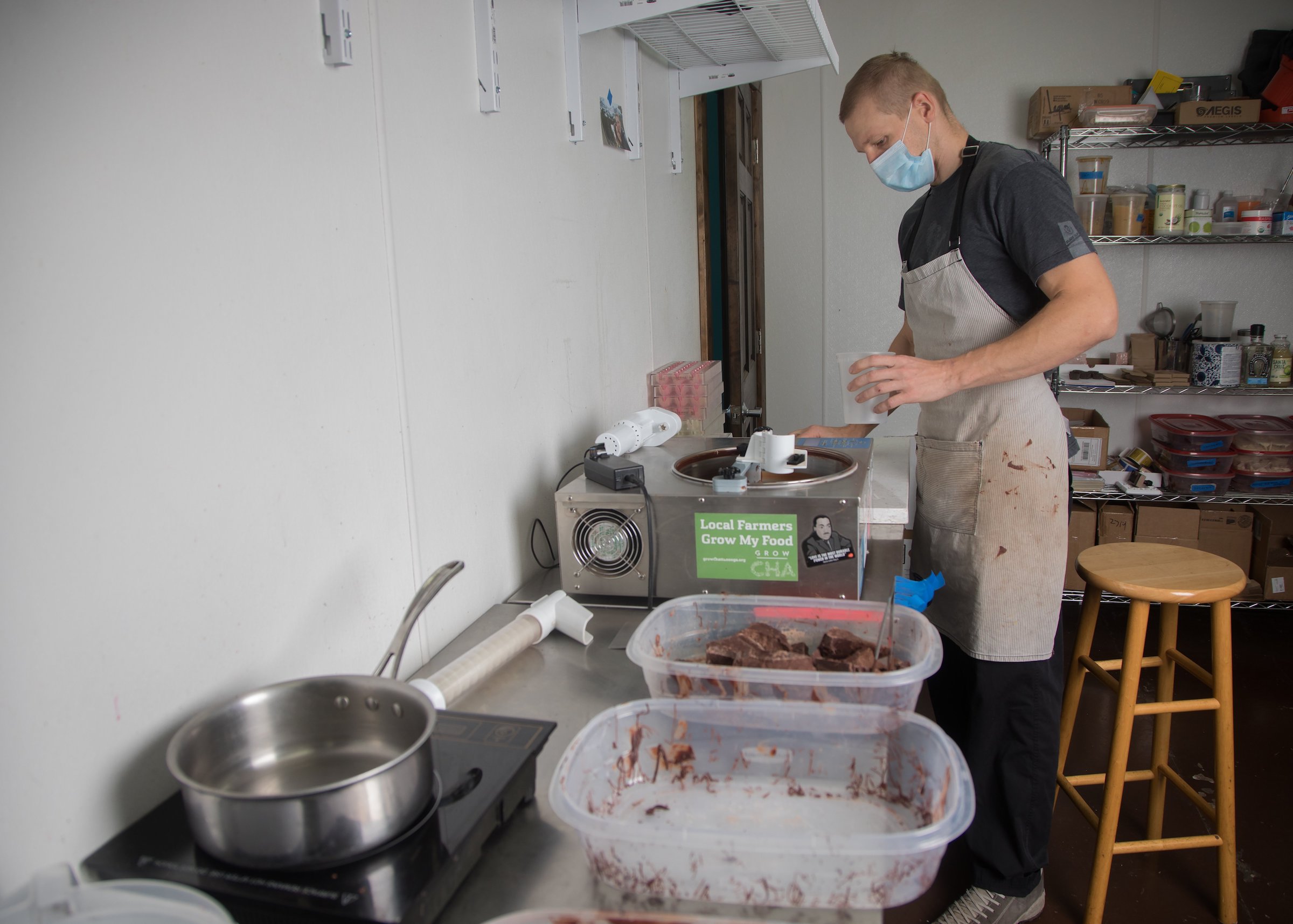 Staff photo by Troy Stolt / Brendan Patrick, owner and operator of Belle Chocolates, makes chocolates in his kitchen on Monday, Dec. 21, 2020 in Chattanooga, Tenn.