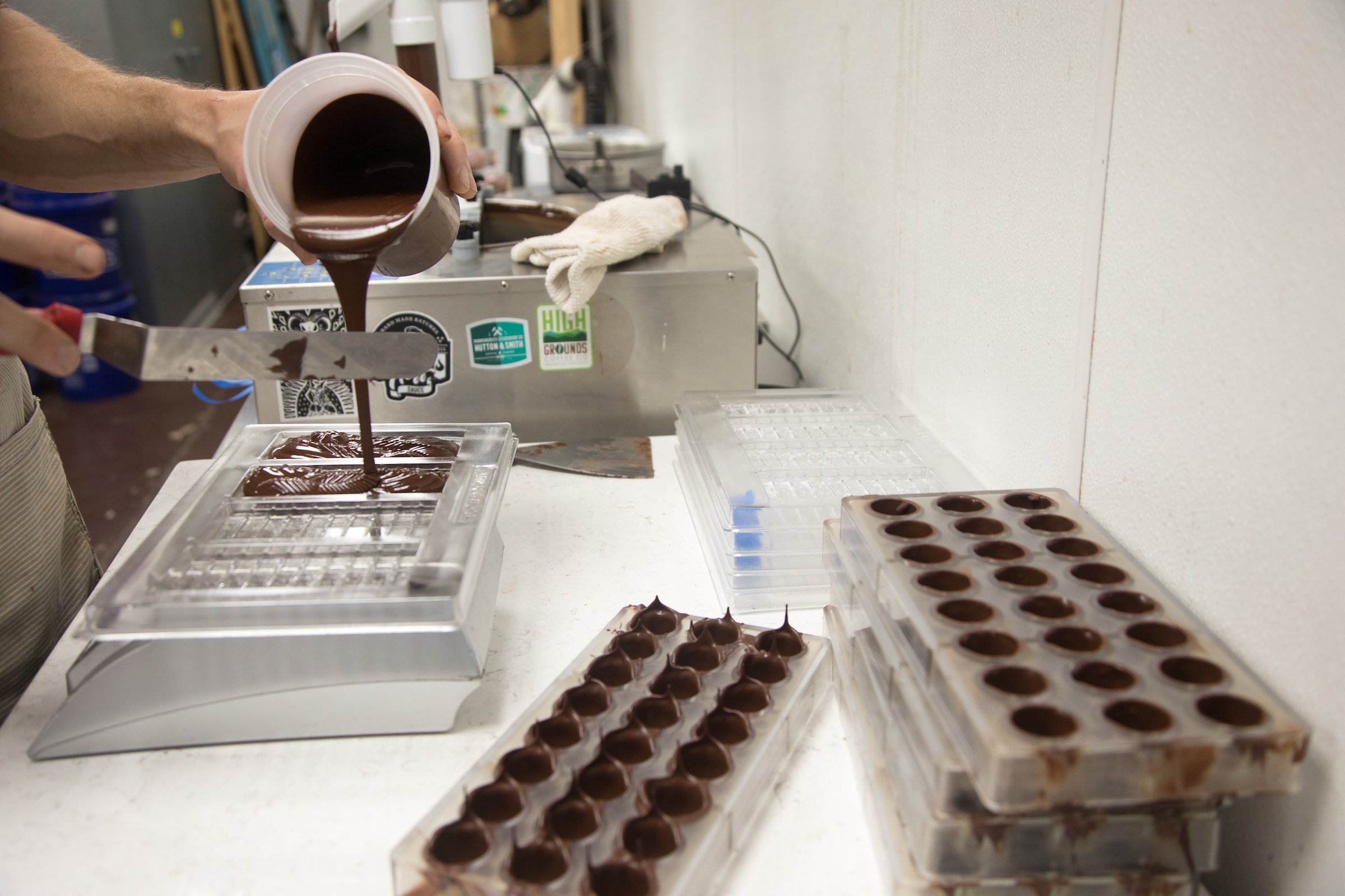 Staff photo by Troy Stolt / Brendan Patrick, owner and operator of Belle Chocolates, makes chocolates in his kitchen on Chattanooga's North Shore.