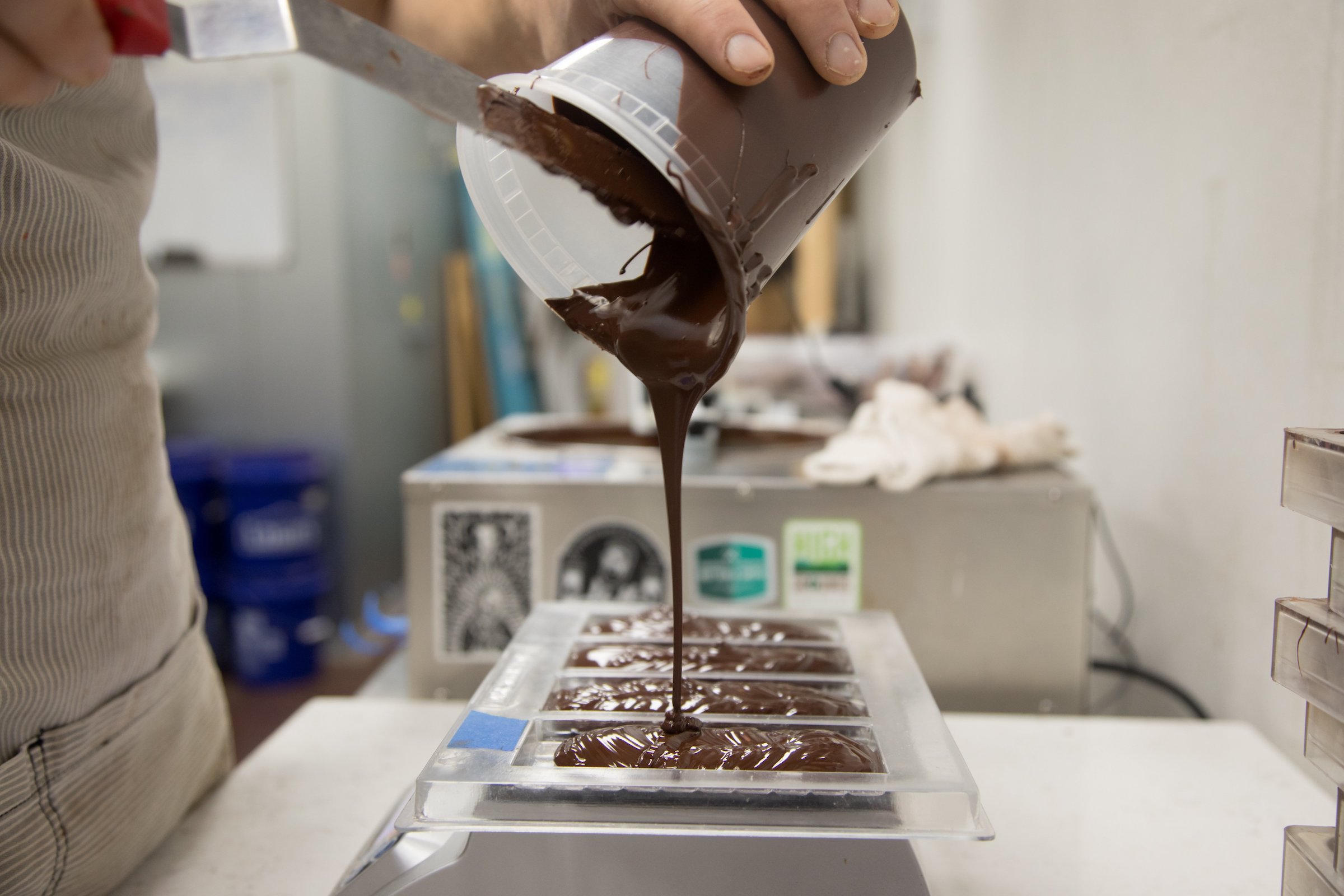 Staff photo by Troy Stolt / Brendan Patrick, owner and operator of Belle Chocolates, makes chocolates in his kitchen on Chattanooga's North Shore.