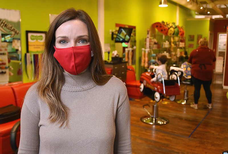 Staff Photo by Matt Hamilton / Owner Kelly Hailey at the North Shore location of her Pigtails and Crewcuts business. Hailey has used Paycheck Protection Program finding to keep her business going during the pandemic, and is applying for another round of the forgivable federal loans.