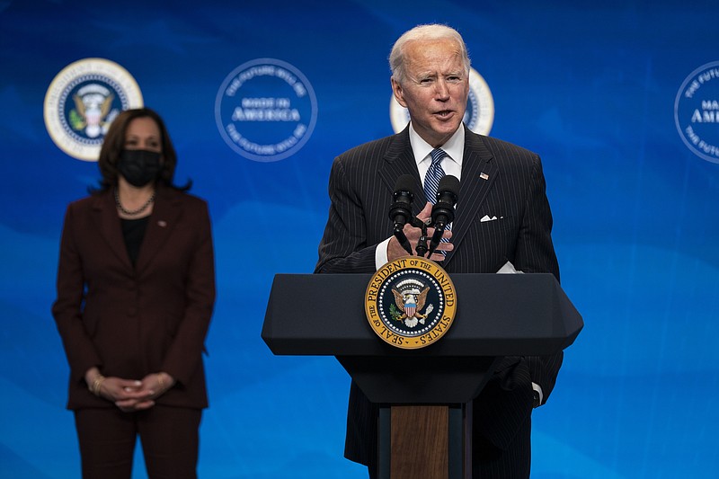 Photo by Evan Vucci of The Associated Press / President Joe Biden answers questions from reporters in the South Court Auditorium on the White House complex on Monday, Jan. 25, 2021, in Washington.