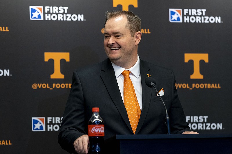 Tennessee Athletics photo by Andrew Ferguson / New Tennessee football coach Josh Heupel laughs during Wednesday afternoon's news conference in Knoxville.