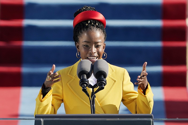 Photo by Patrick Semansky of The Associated Press, Pool / American poet Amanda Gorman reads a poem during the 59th Presidential Inauguration at the U.S. Capitol in Washington on Wednesday, Jan. 20, 2021.