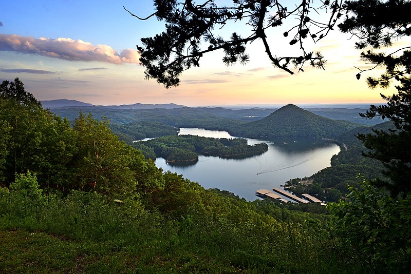 Staff Photo by Robin Rudd / Parksville Lake glistens just after sunset in this view from the Lakeview Overlook on Chilhowee Mountain on May 29, 2020.