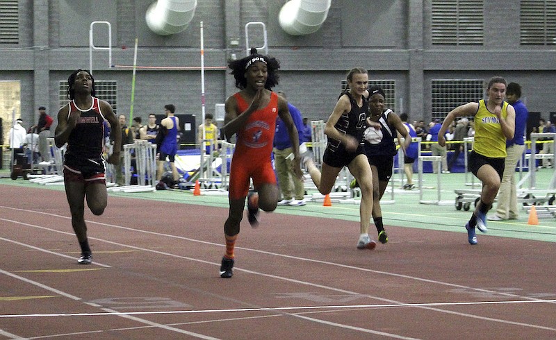 FILE - In this Feb. 7, 2019 file photo, Bloomfield High School transgender athlete Terry Miller, second from left, wins the final of the 55-meter dash over transgender athlete Andraya Yearwood, far left, and other runners in the Connecticut girls Class S indoor track meet at Hillhouse High School in New Haven, Conn. (AP Photo/Pat Eaton-Robb, File)
