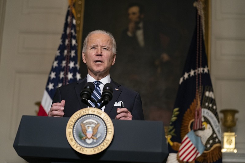 President Joe Biden delivers remarks on climate change and green jobs, in the State Dining Room of the White House, Wednesday, Jan. 27, 2021, in Washington. (AP Photo/Evan Vucci)


