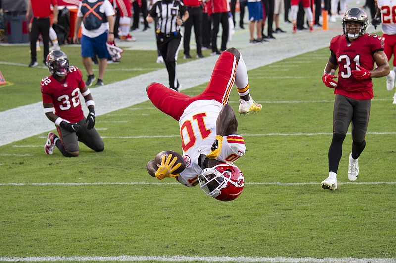 AP photo by Doug Murray / Kansas City Chiefs wide receiver Tyreek Hill backflips into the end zone to score a touchdown against the host Tampa Bay Buccaneers on Nov. 29. Hill caught 13 passes for 269 yards and three touchdowns in Kansas City's 27-24 victory in that Week 12 game, but now the Chiefs return to Raymond James Stadium to face the Bucs in Super Bowl LV next Sunday.