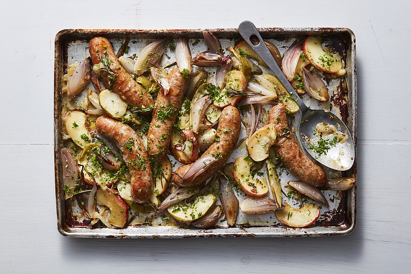 Sheet-Pan Sausages With Caramelized Shallots and Apples is a satisfying sweet and savory meal that can be prepared in under an hour using a single dish for mixing and baking. / Photo by Christopher Testani/The New York Times