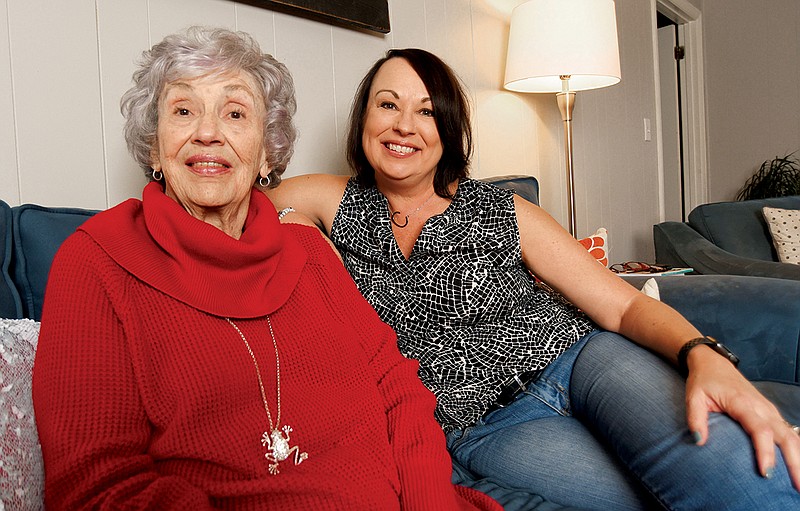 Staff photo by Matt Hamilton / Carla Eischeid sits with her mother, Frances Durham.